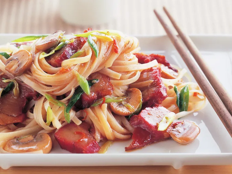 chinese barbecued pork and rice noodle stir-fry