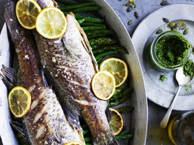 baked baby barramundi with pumpkin seed pesto