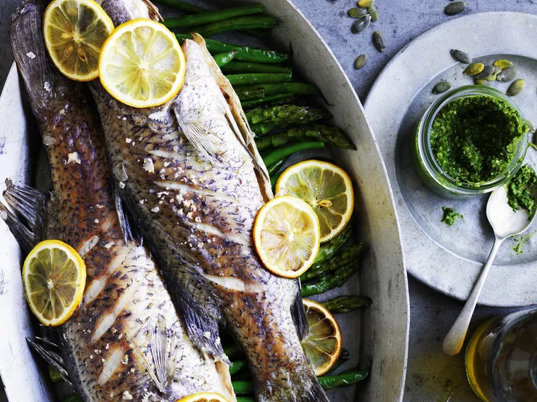 baked baby barramundi with pumpkin seed pesto