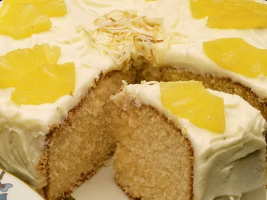 PINEAPPLE COCONUT CAKE WITH PINEAPPLE FROSTING