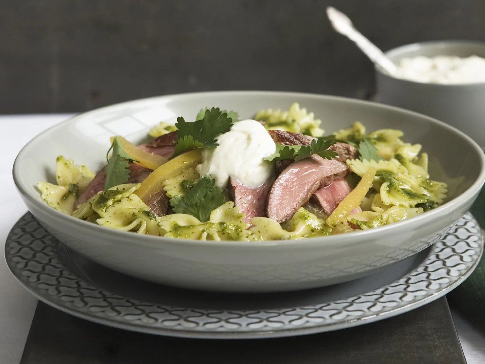 lamb and pasta with walnut and coriander pesto