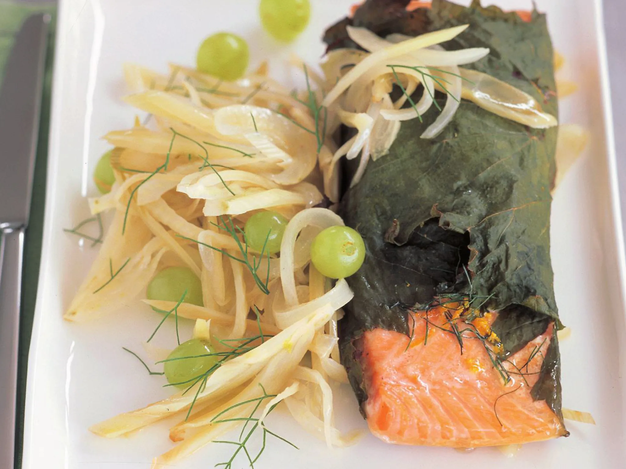 Vineleaf-wrapped ocean trout withbraised fennel
