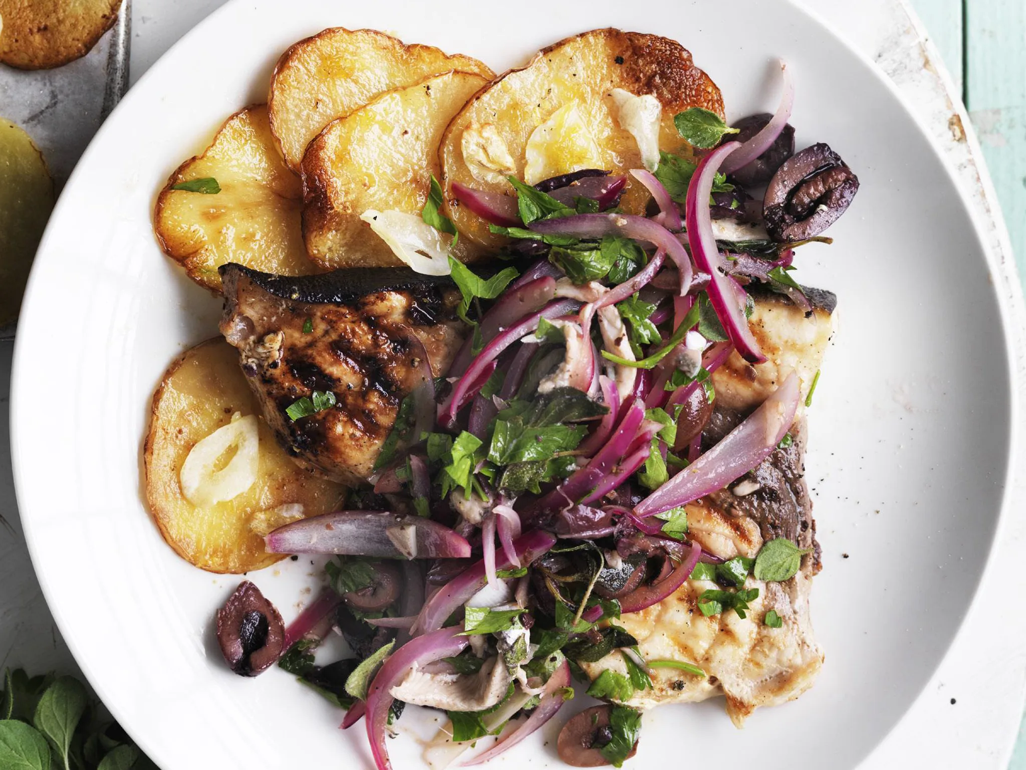 fish steaks with kalamata olive dressing