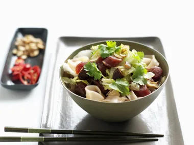 fried noodles with sausage and cabbage