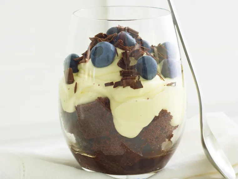 chocolate trifle with blueberries and cream