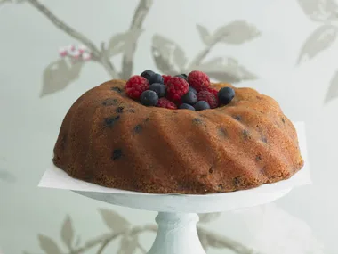 mixed berry cake with vanilla bean syrup