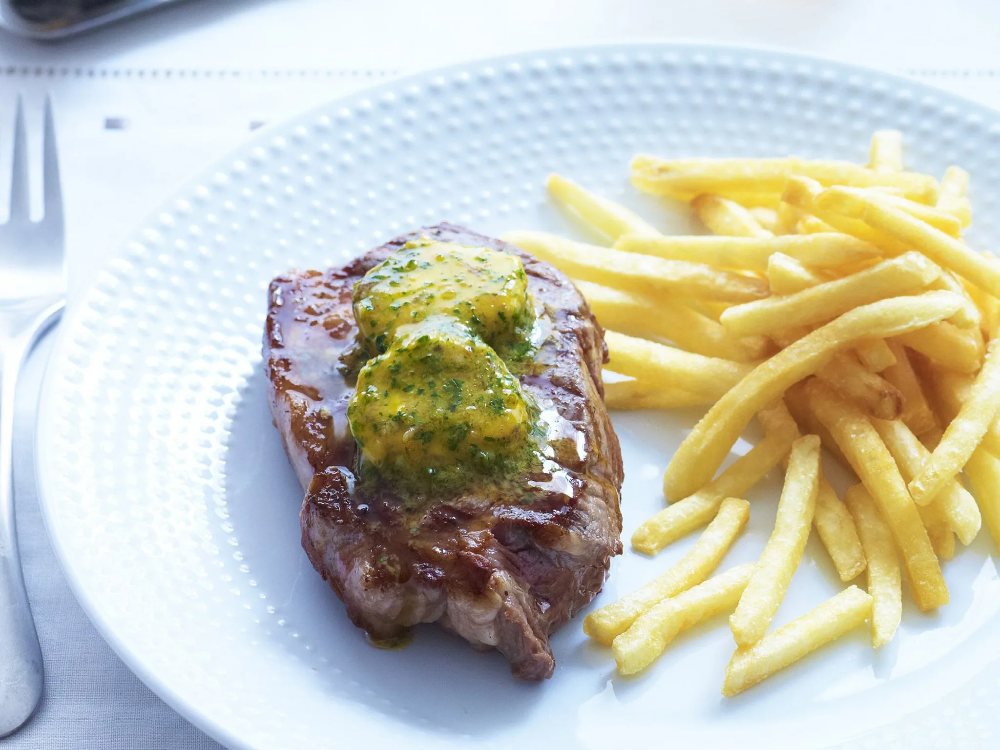 char-grilled steaks with café de paris butter amp; shoestring fries