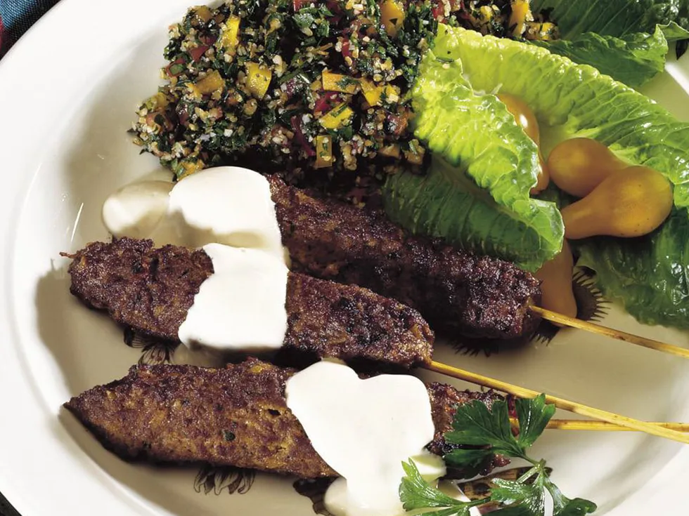 lamb kofta with yogurt    tahini      sauce