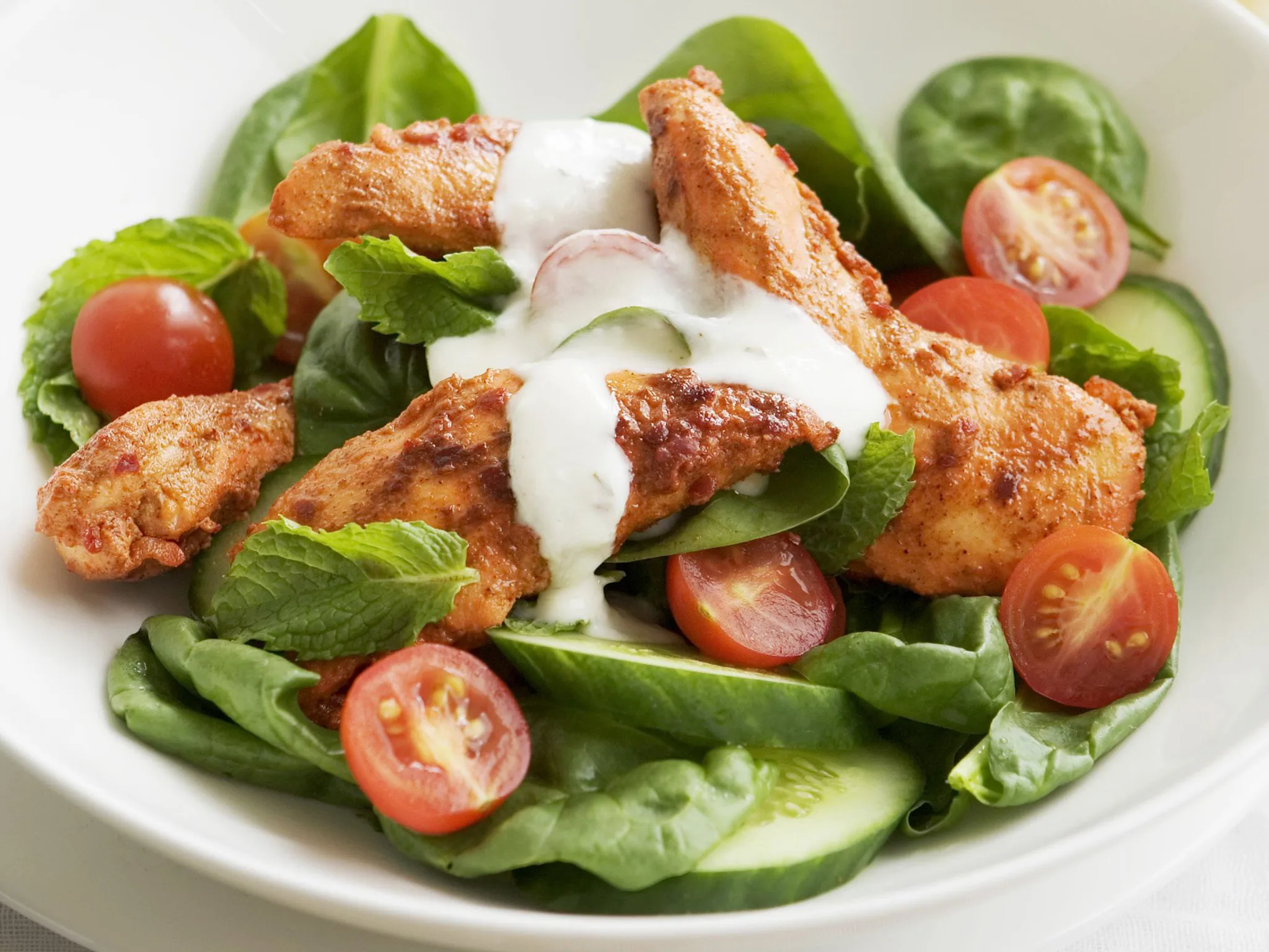 tandoori chicken, spinach and mint with spiced yoghurt