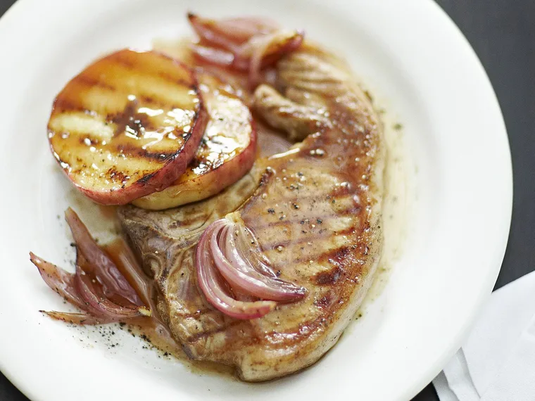 GRILLED PORK LOIN CHOPS WITH APPLE AND ONION PLUM SAUCE