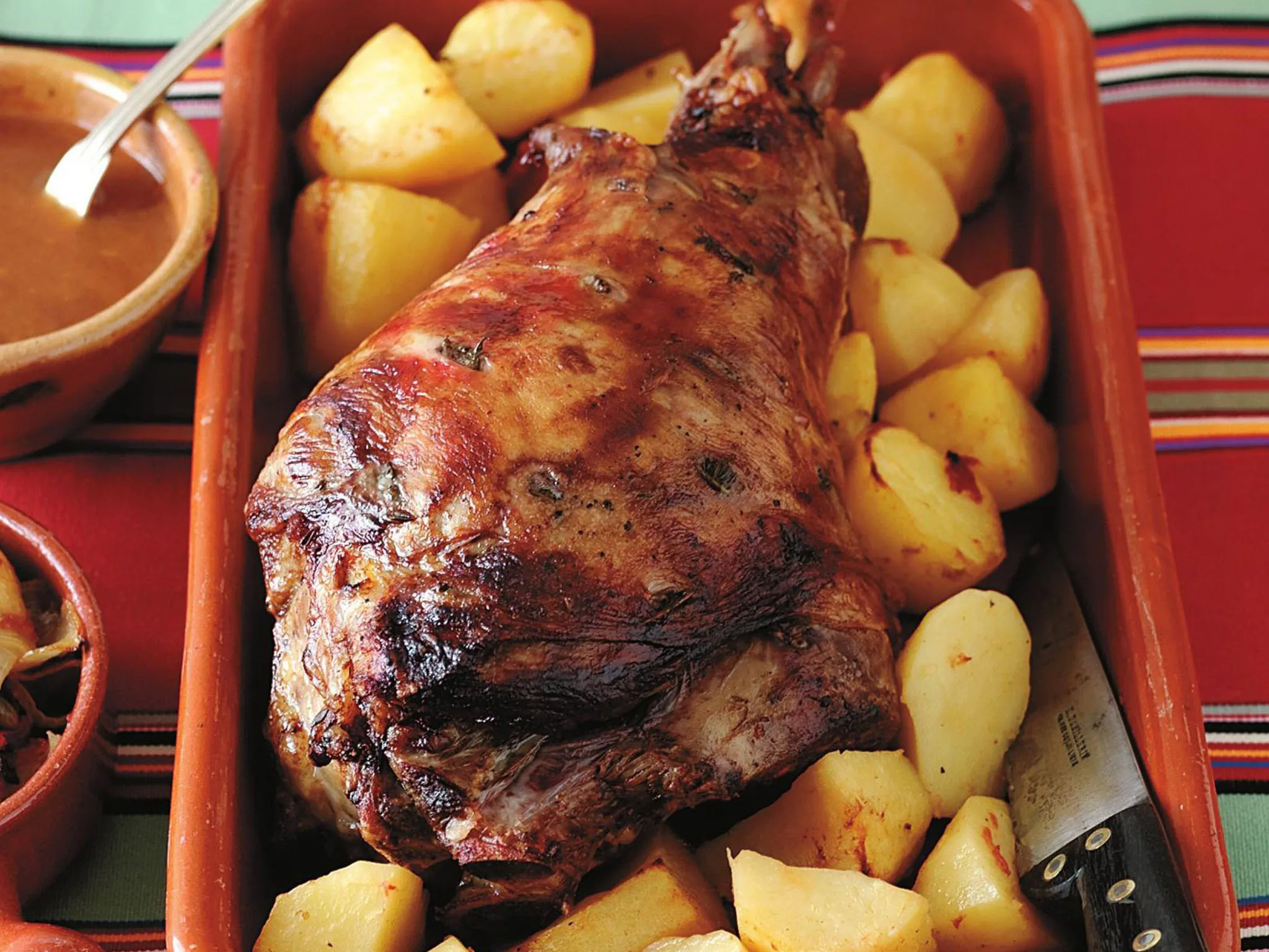Roast lamb with tomato and potatoes