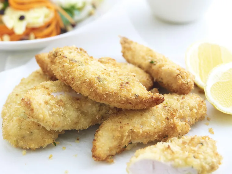 lemon and thyme chicken schnitzel with coleslaw