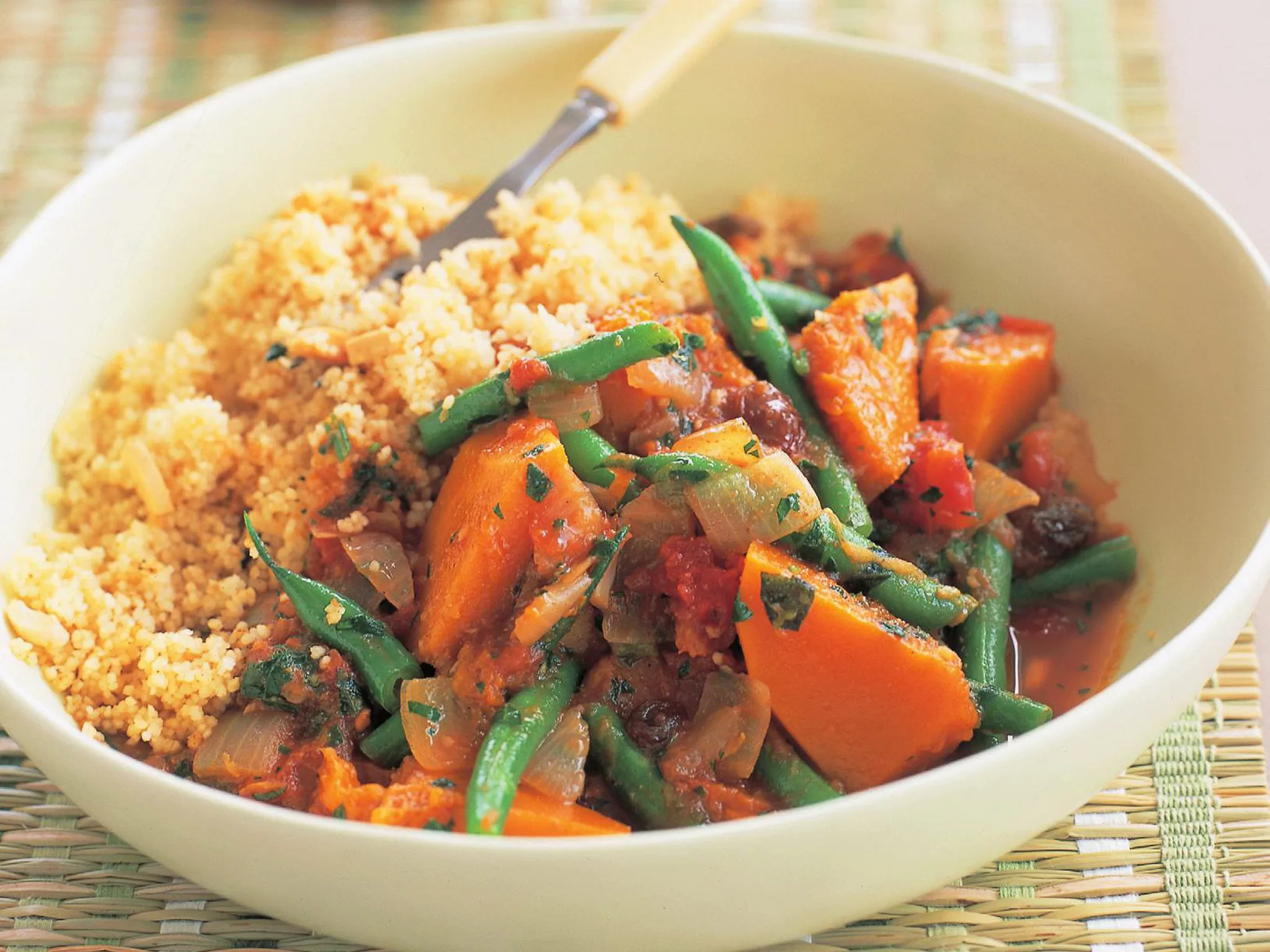 Sweet pumpkin tagine with harissa and almond couscous