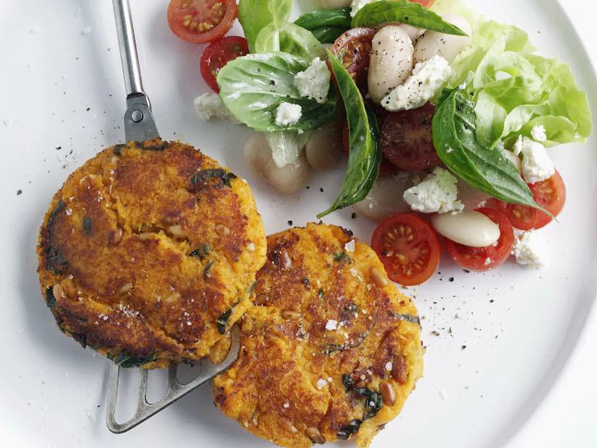 basil butter kumara patties with tomato and bean salad