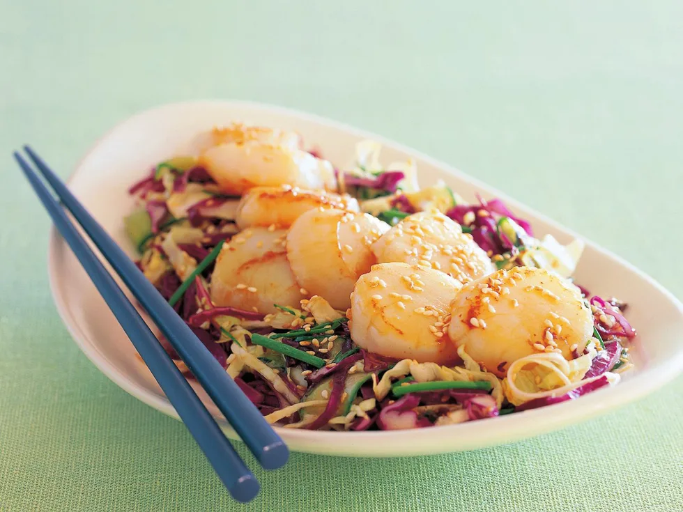 Seared scallops with mixed cabbage salad