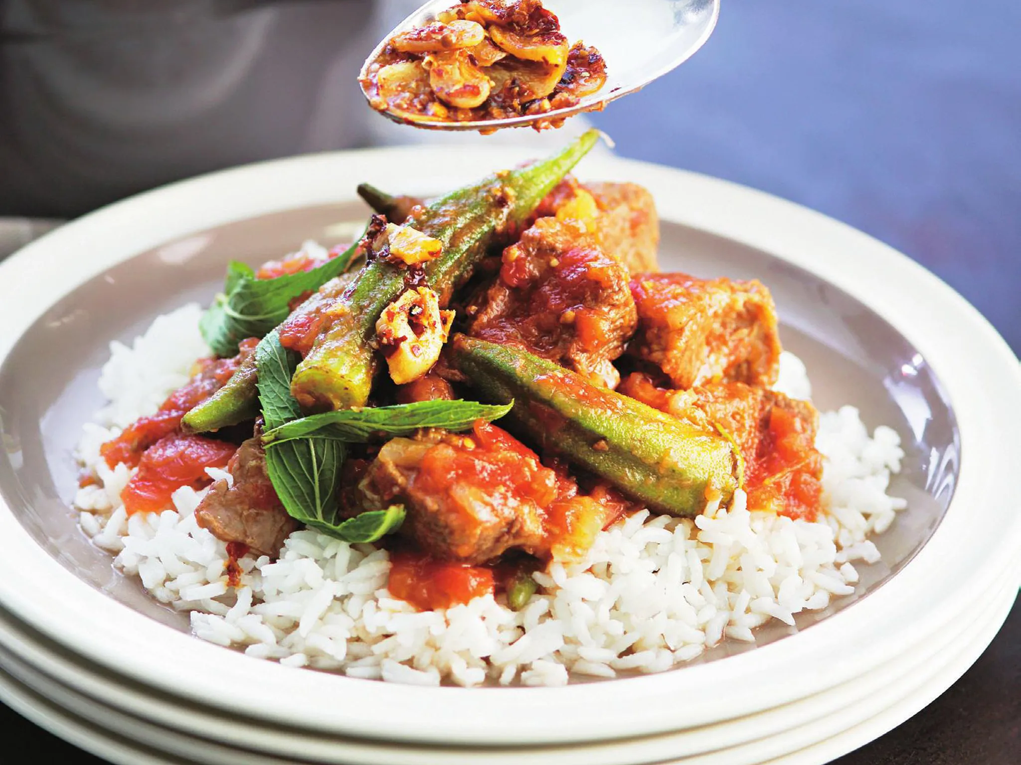 Lamb and okra in rich tomato sauce with garlic confit