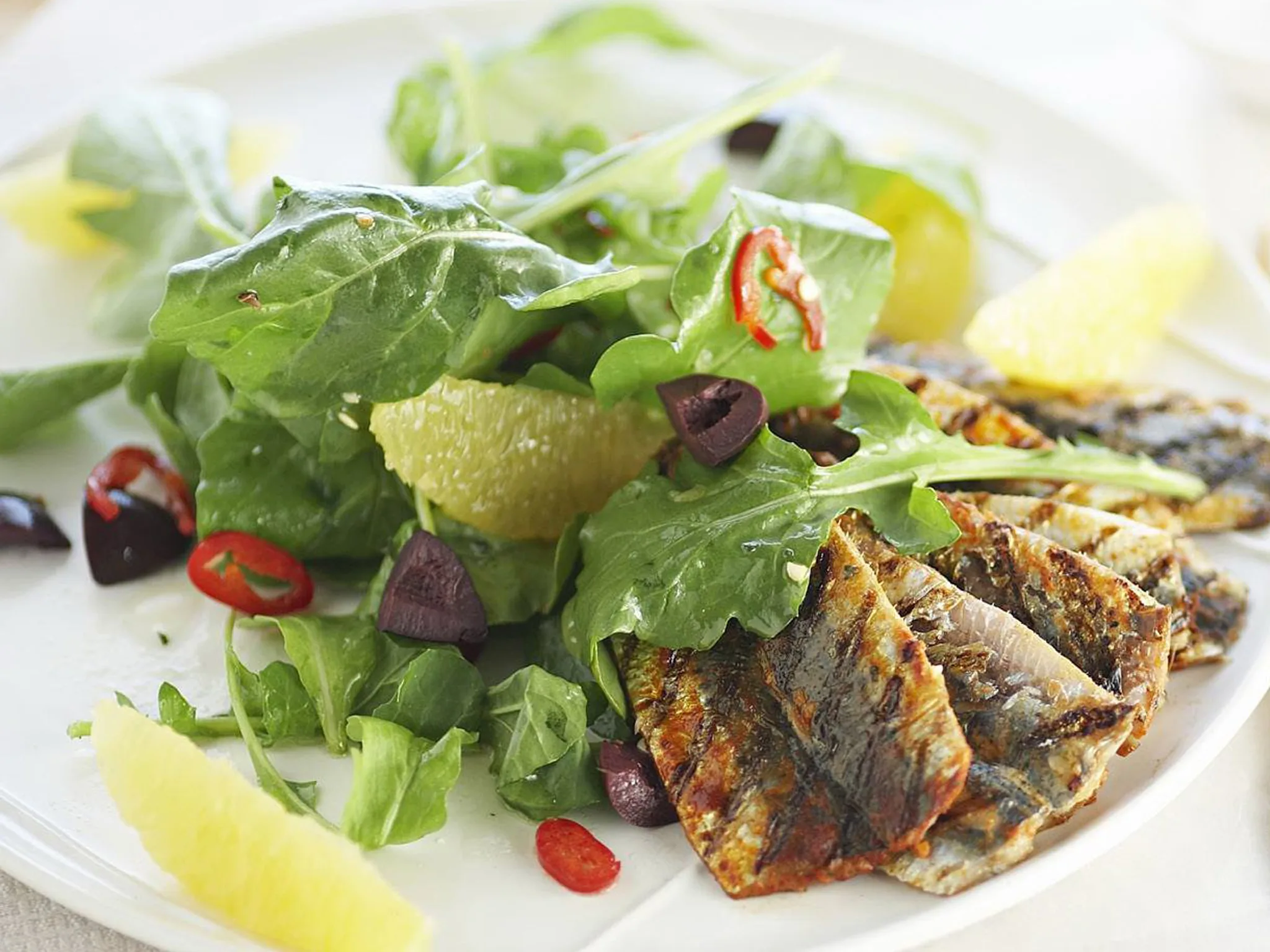 Spicy sardines with orange and olive salad