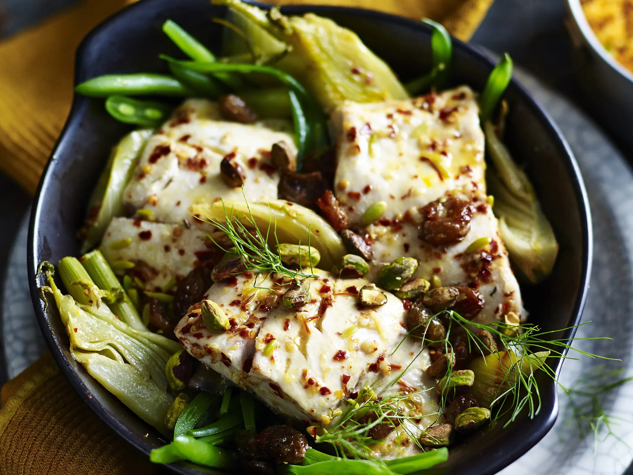 SPICY FISH TAGINE WITH RED COUSCOUS