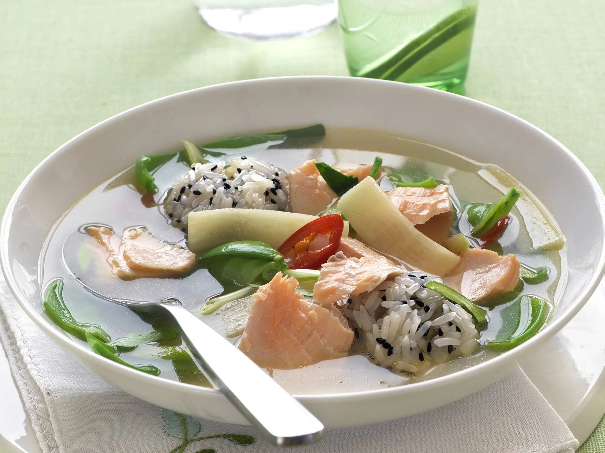 thai salmon broth with sesame sticky rice patties