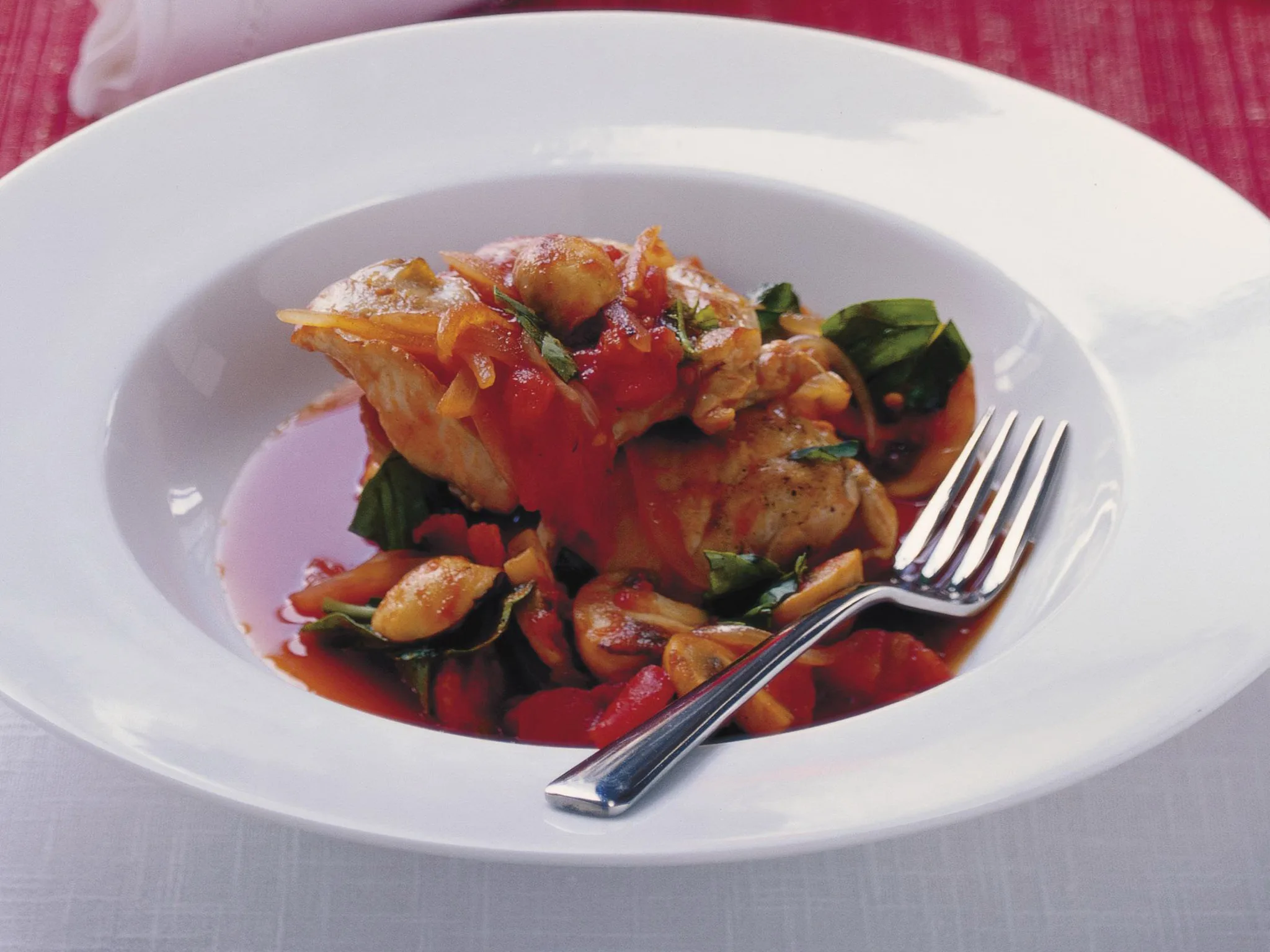 Chicken in red wine and tomato sauce