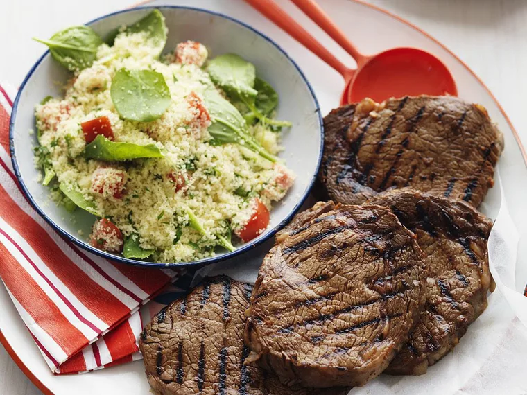 rib-eye steaks with couscous salad