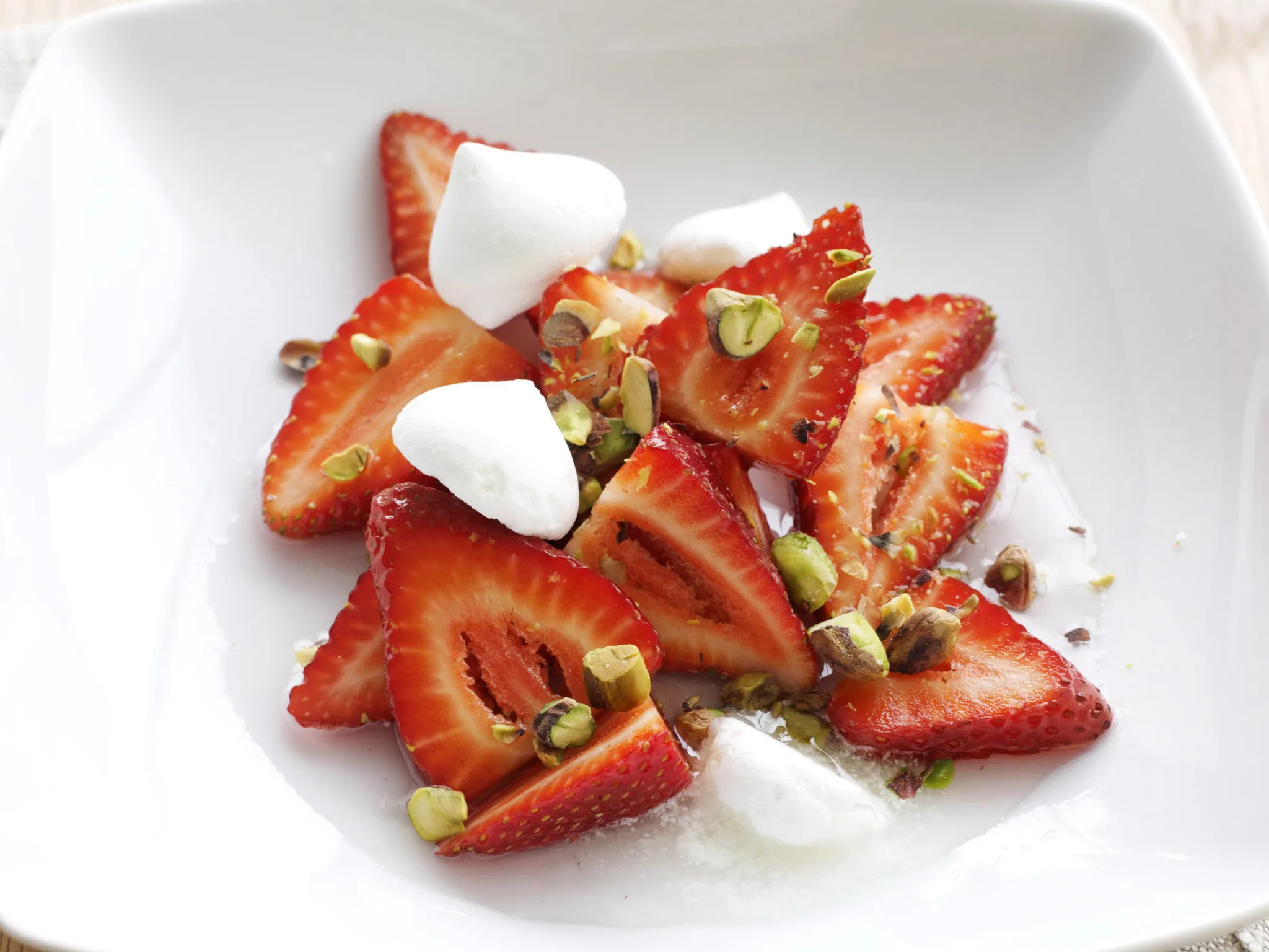 strawberries in rosewater syrup