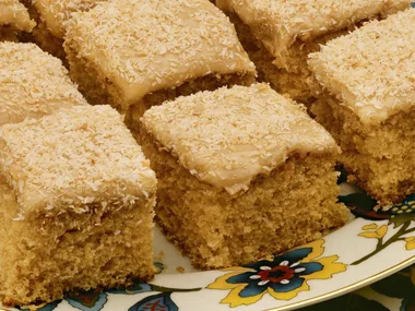 HONEY COCONUT CAKE WITH CARAMEL ICING
