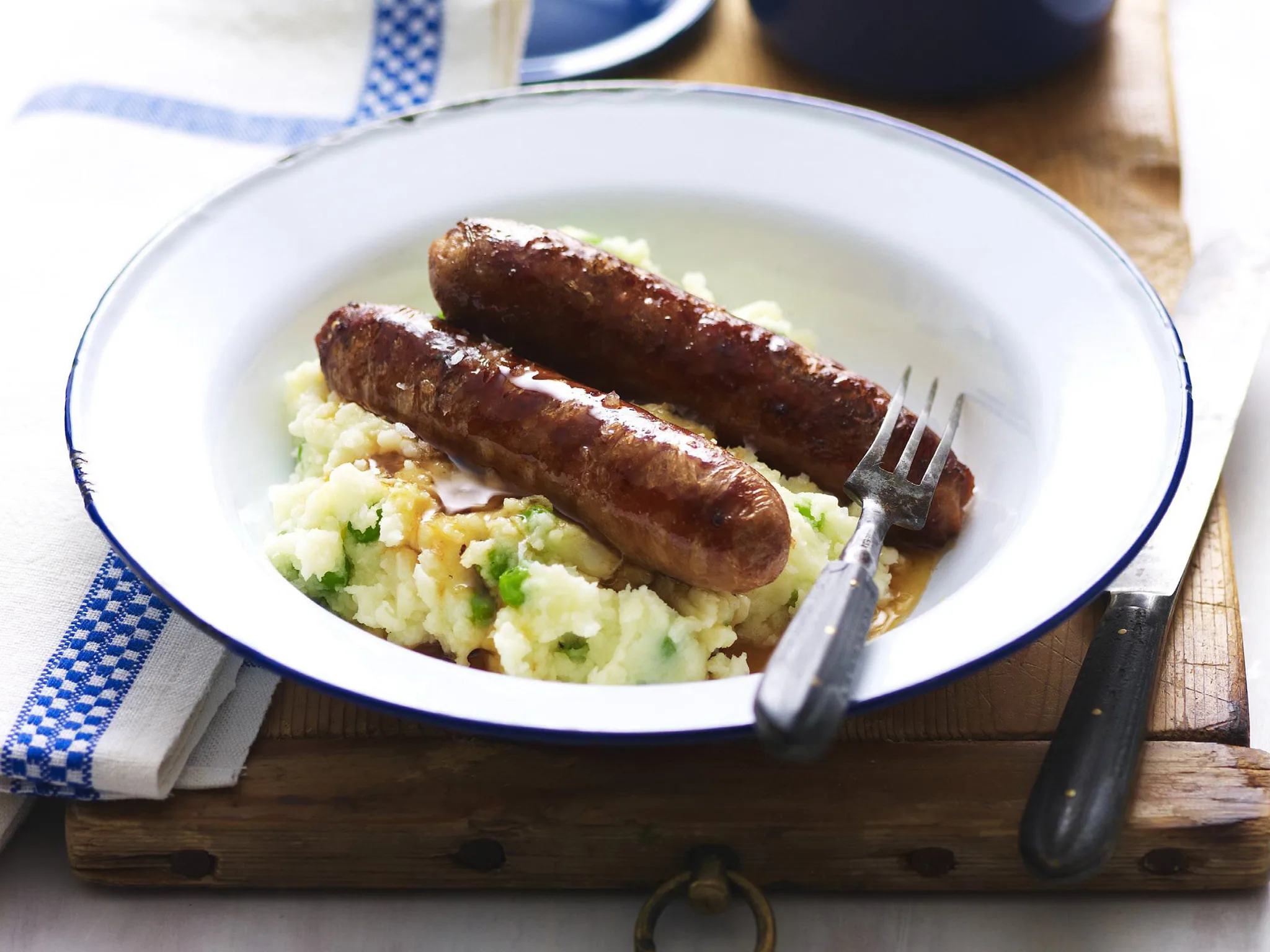 lamb sausages with pea mash