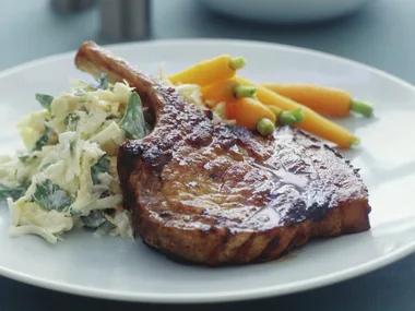 glazed pork cutlets with celeriac salad