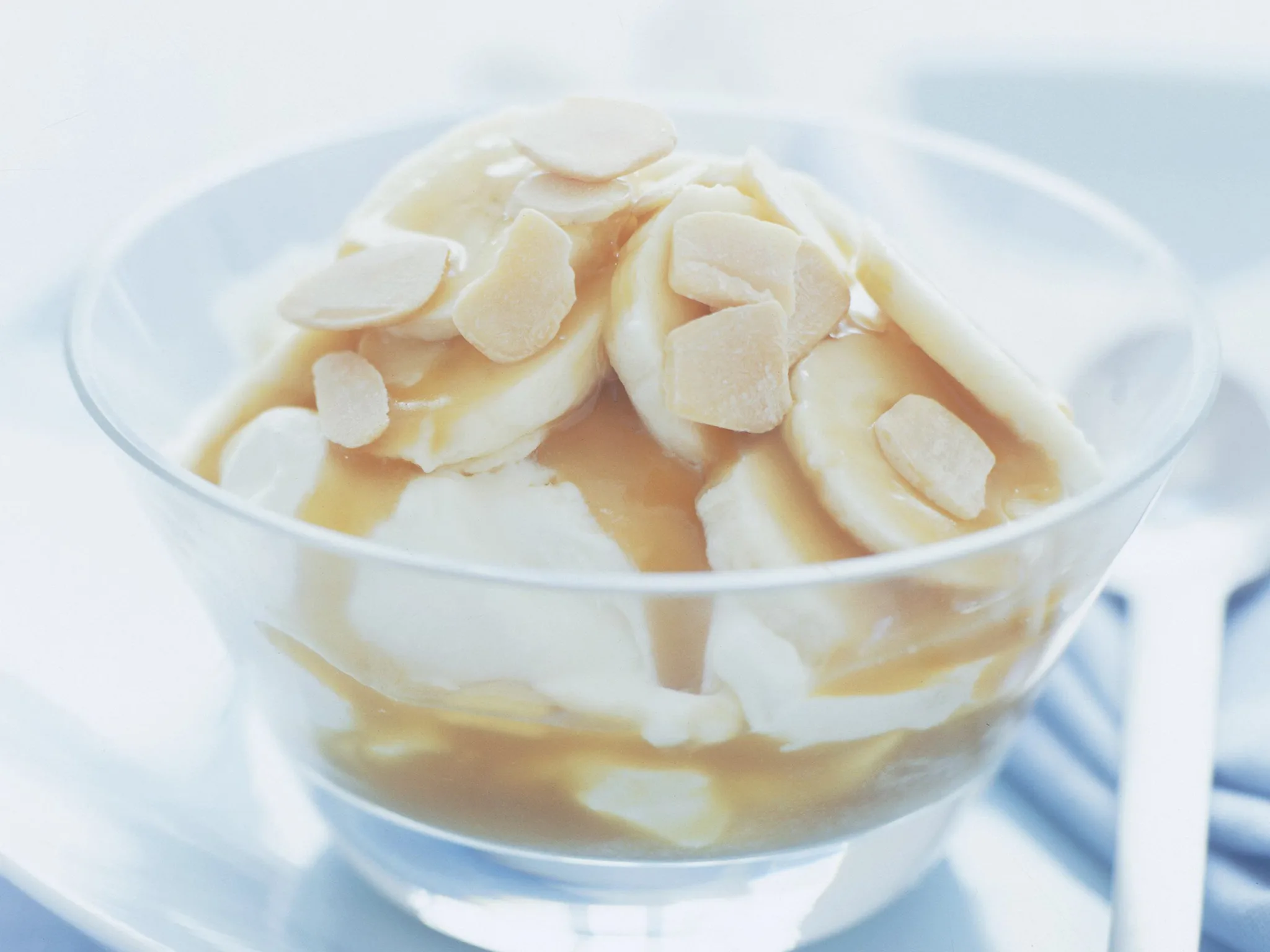 layered banana split with caramel sauce