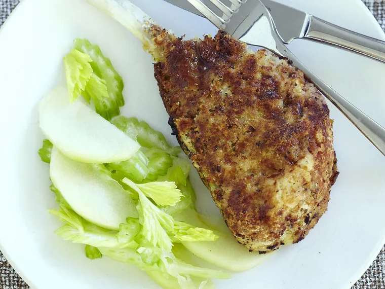 baked pork schnitzel with pickled apple and celery salad