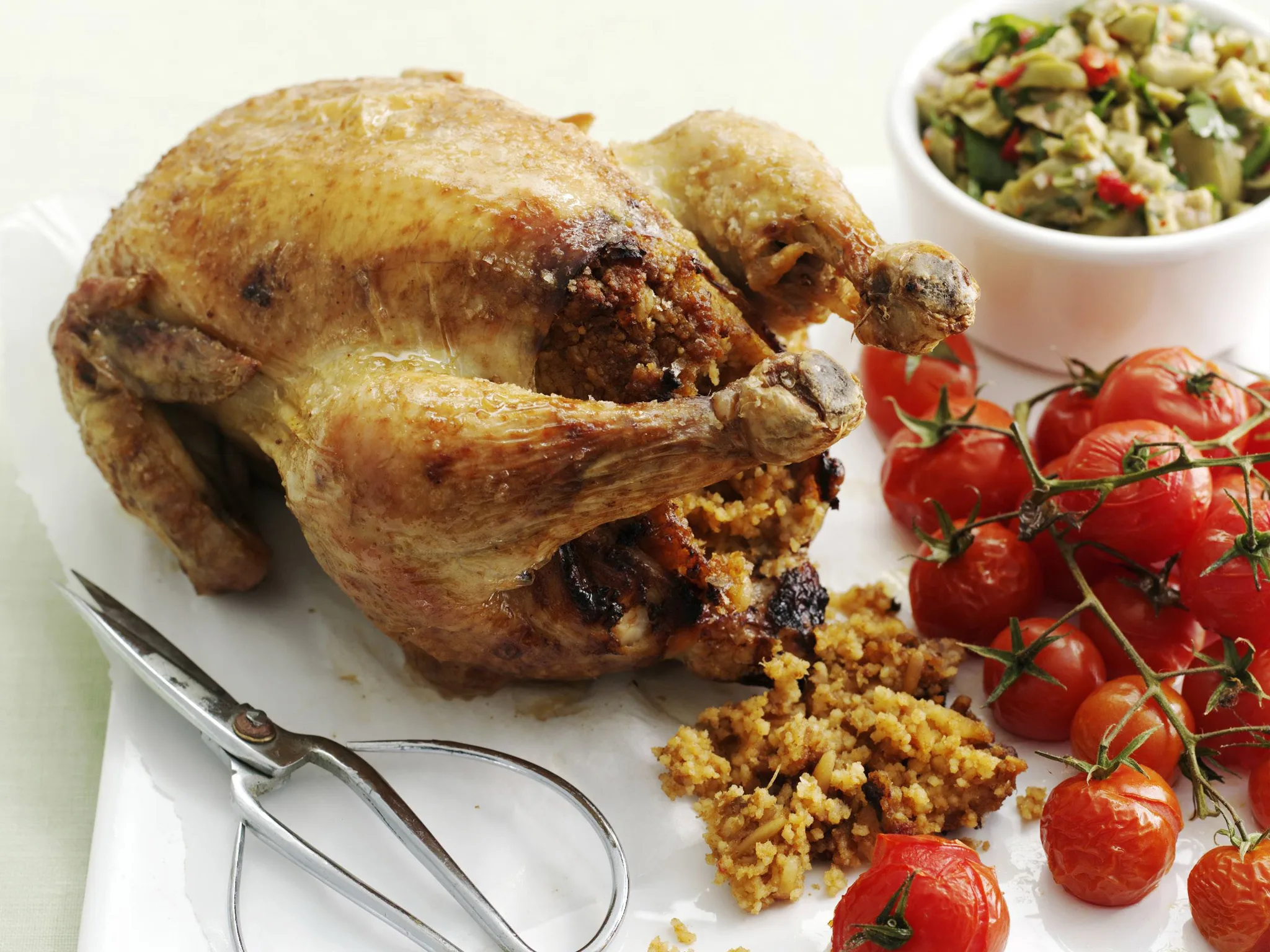moroccan chicken with couscous stuffing and green olive salsa