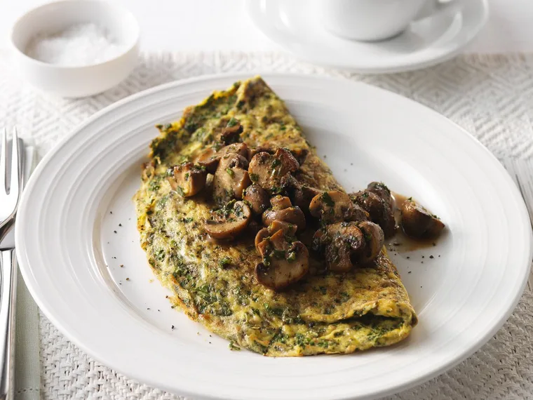 herb omelette with saut&eacute;ed mushrooms