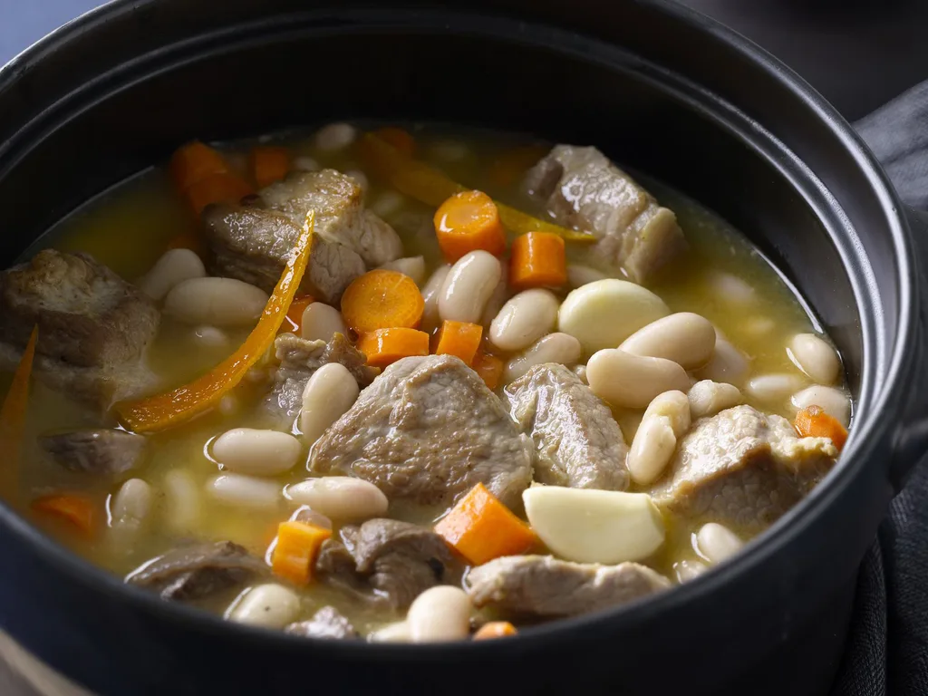 pork neck, orange and white bean stew