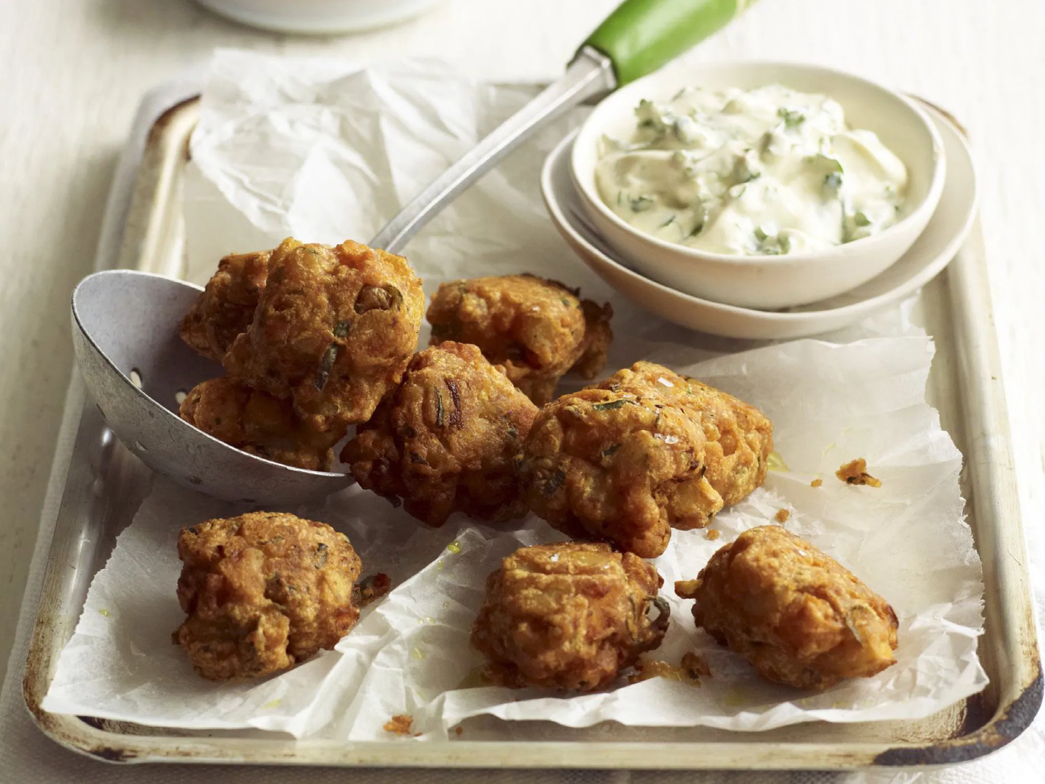 spicy potato pakoras with coriander raita