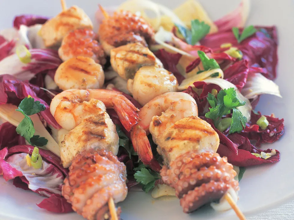 seafood skewers with radicchio and fennel salad