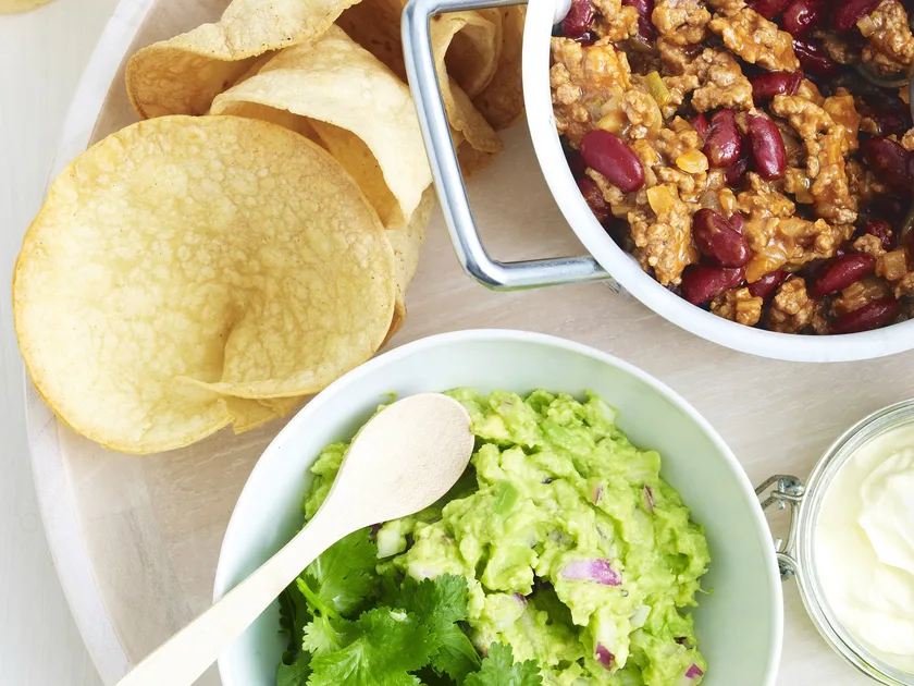 Beef and bean tostadas with chunky guacamole