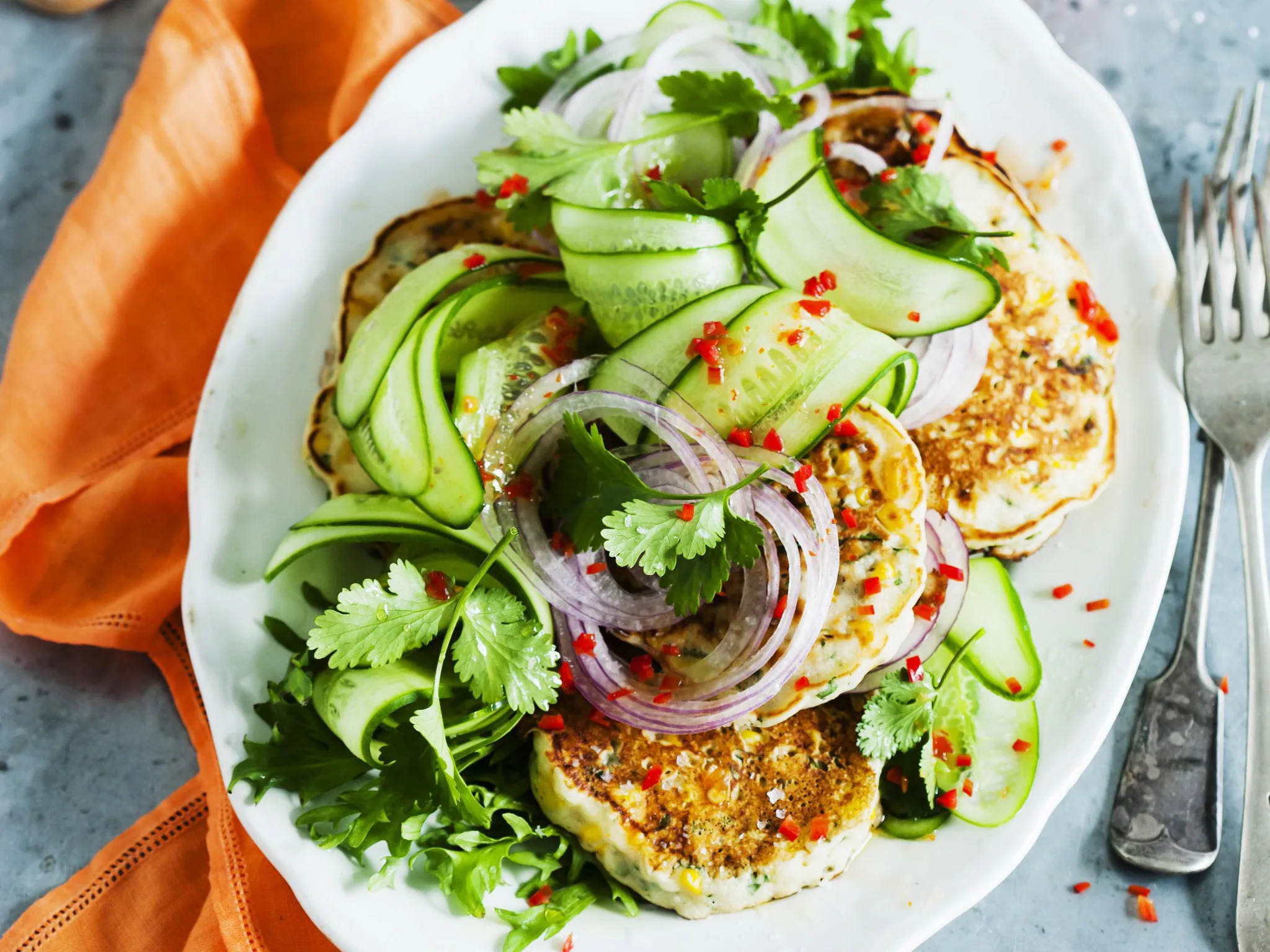 corn fritters with cucumber salad