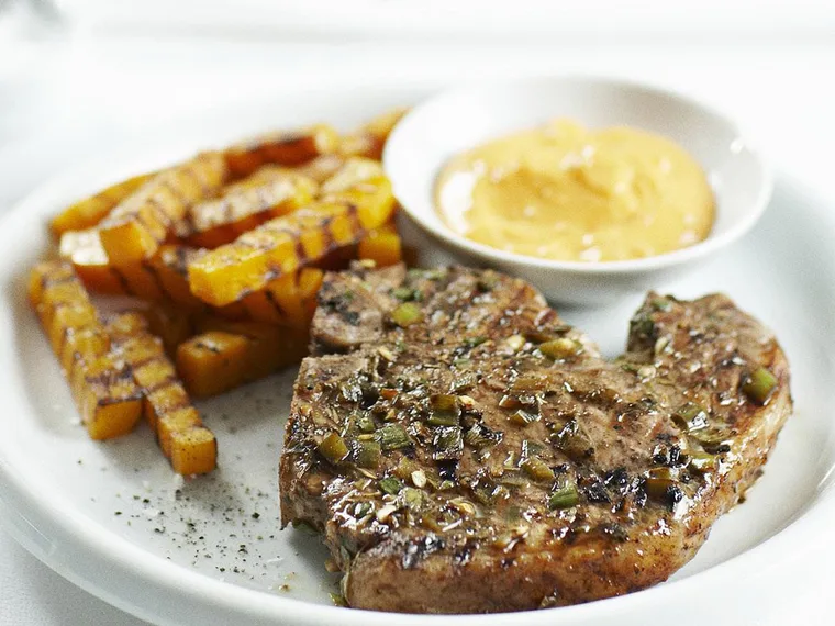 Jerk pork chops with pumpkin chips