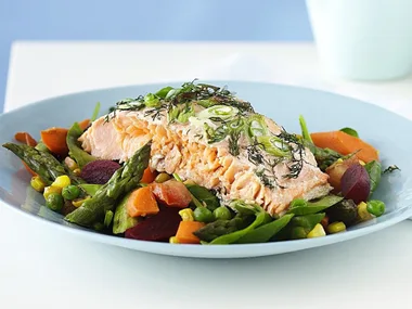 Salmon with warm vegetable salad