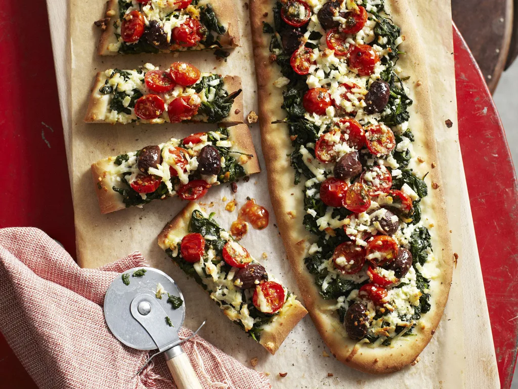 haloumi, spinach and tomato party pizzas