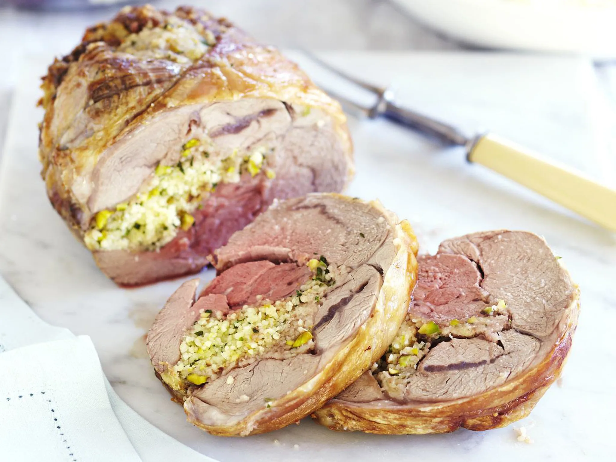 PISTACHIO AND OLIVE STUFFED LAMB FOREQUARTER WITH BEETROOT SALAD