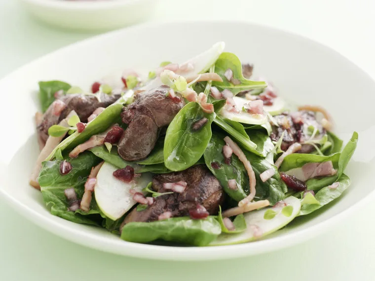 Salad of greens, chicken livers, bacon and apple