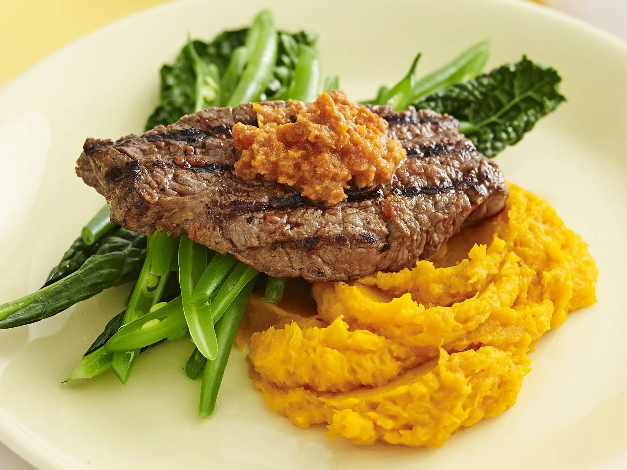 harissa beef with garlic beans and pumpkin mash