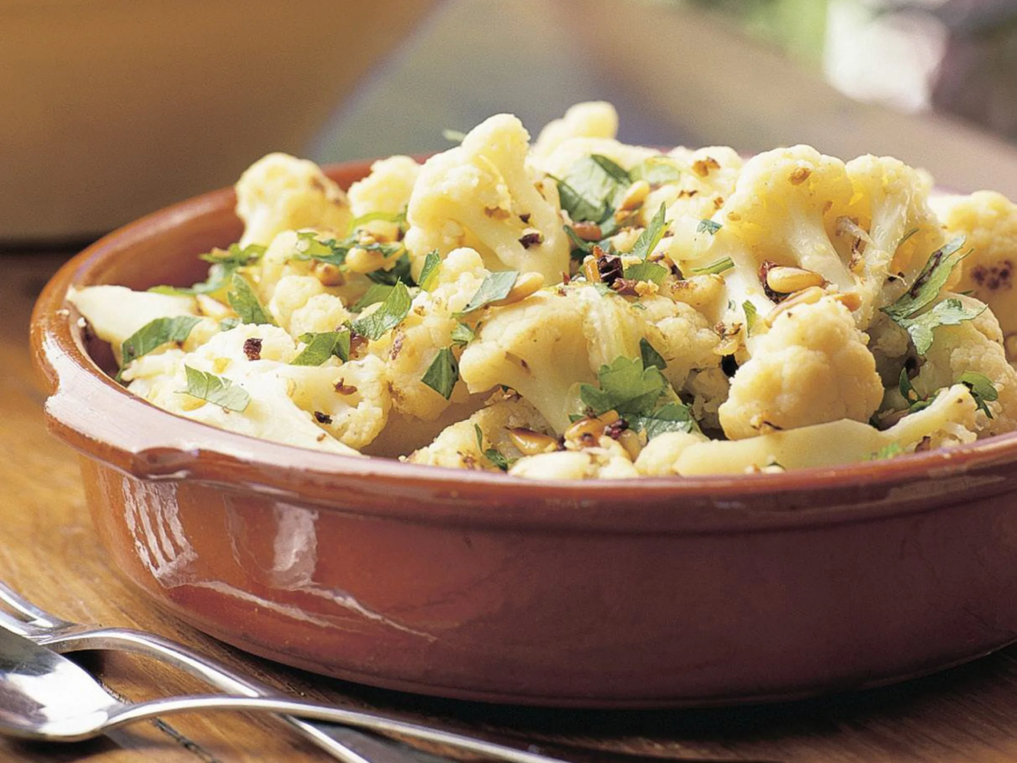 Cauliflower with chilli and pine nuts