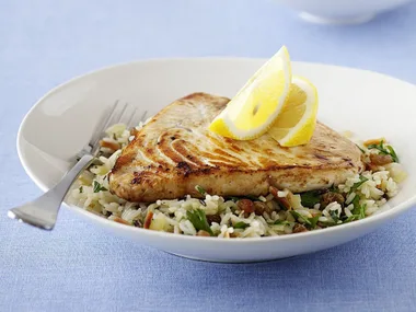 Fish with raisin almond rice