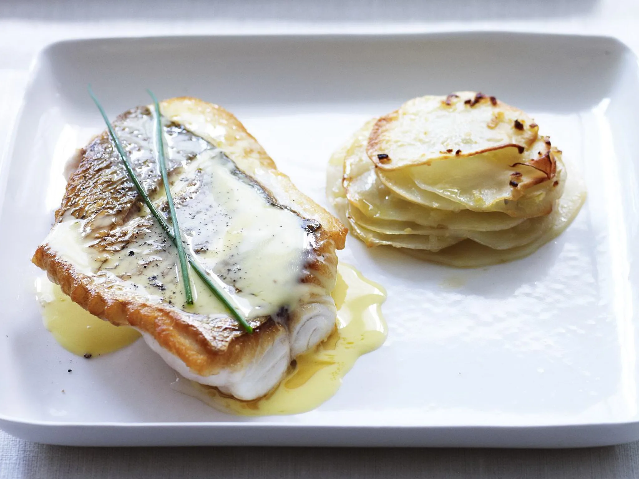 snapper with potato stacks and beurre blanc