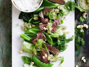 steak with cashew nam jim and asian greens