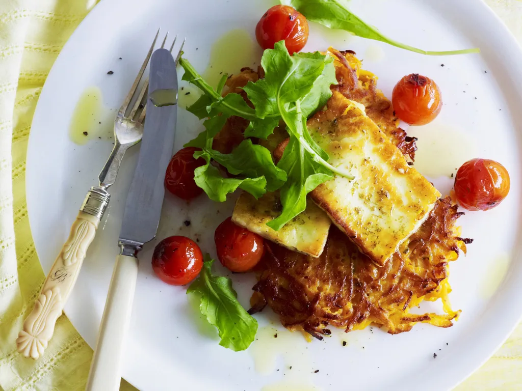 SWEET POTATO RÖSTI WITH  HALOUMI AND TOMATOES