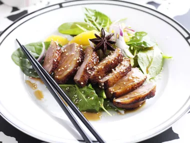 Roast duck with orange and snow pea salad